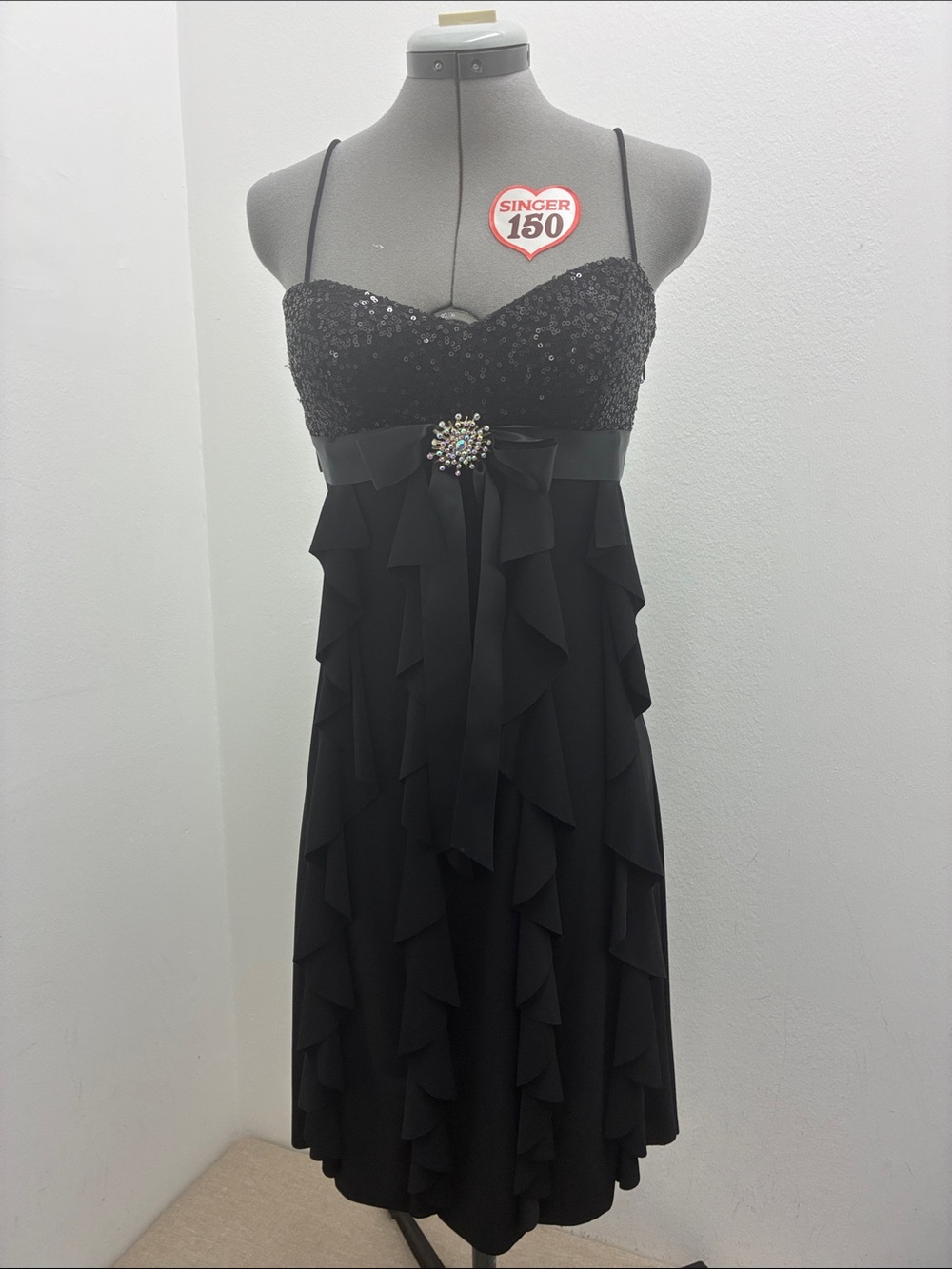 Cache Black Strapless Sequin Bodice Ruffle Cocktail Dress with Brooch